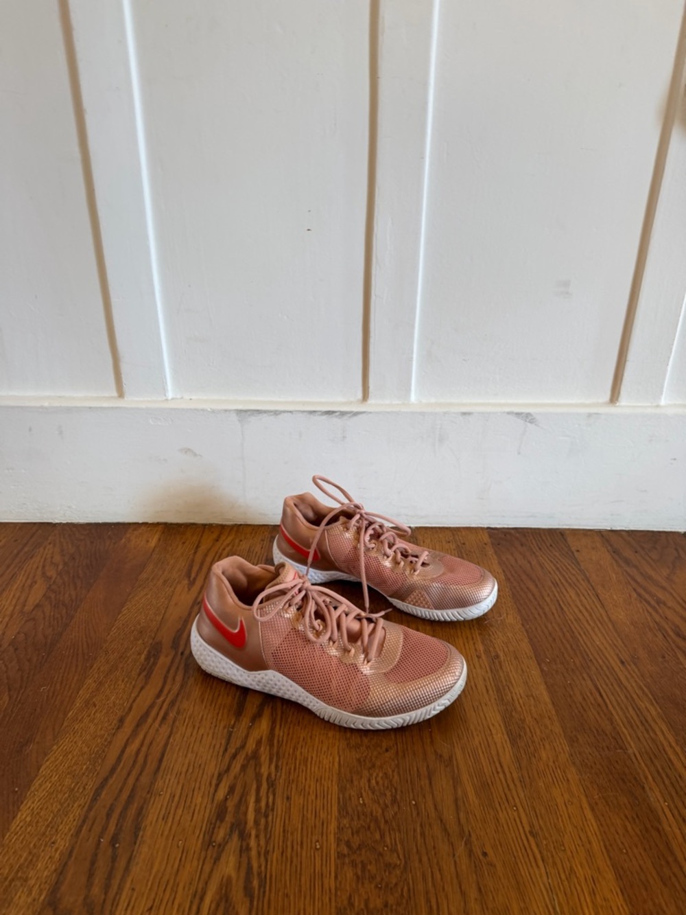 Nike Women’s Rose Gold Tennis Sneakers with Red Swoosh